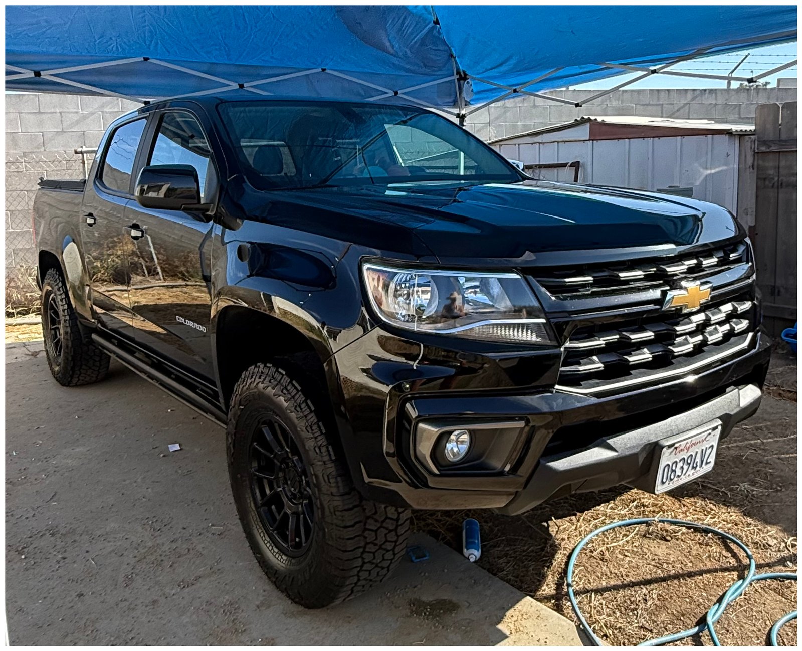 Detailed black lifted Chevrolet Colorado, mobile detailing