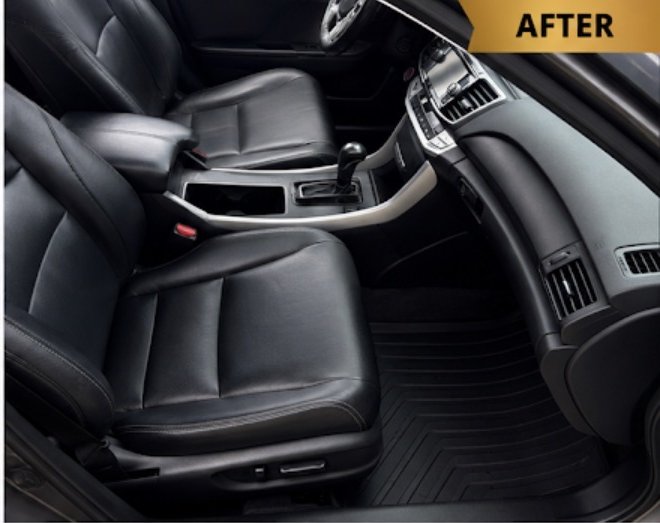 Front seat after detailing — clean conditioned leather and floor mats
