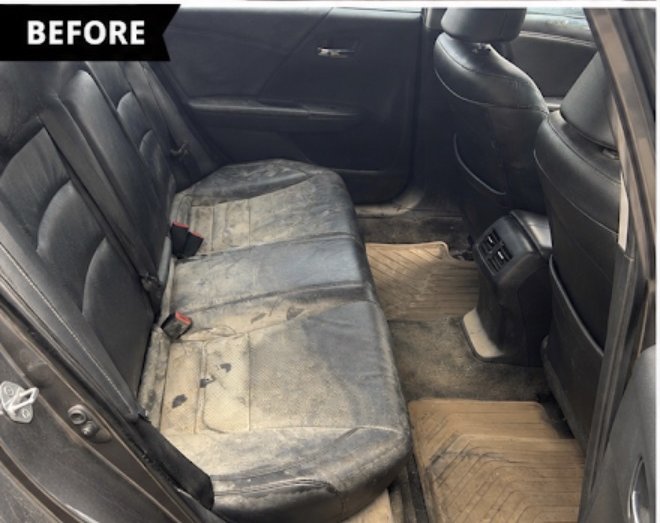 Back seat before detailing — stained, dirty upholstery