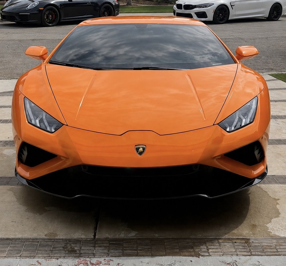 Detailed orange Lamborghini Huracan, mobile detailing