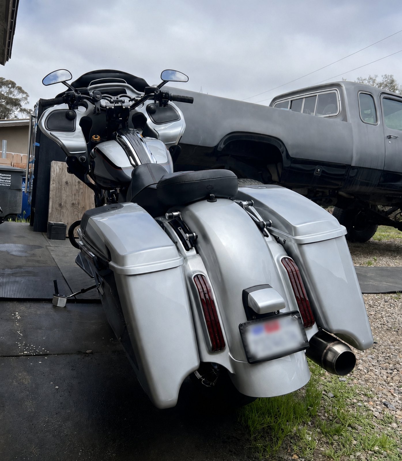 Detailed silver Harley-Davidson bagger motorcycle, mobile detailing