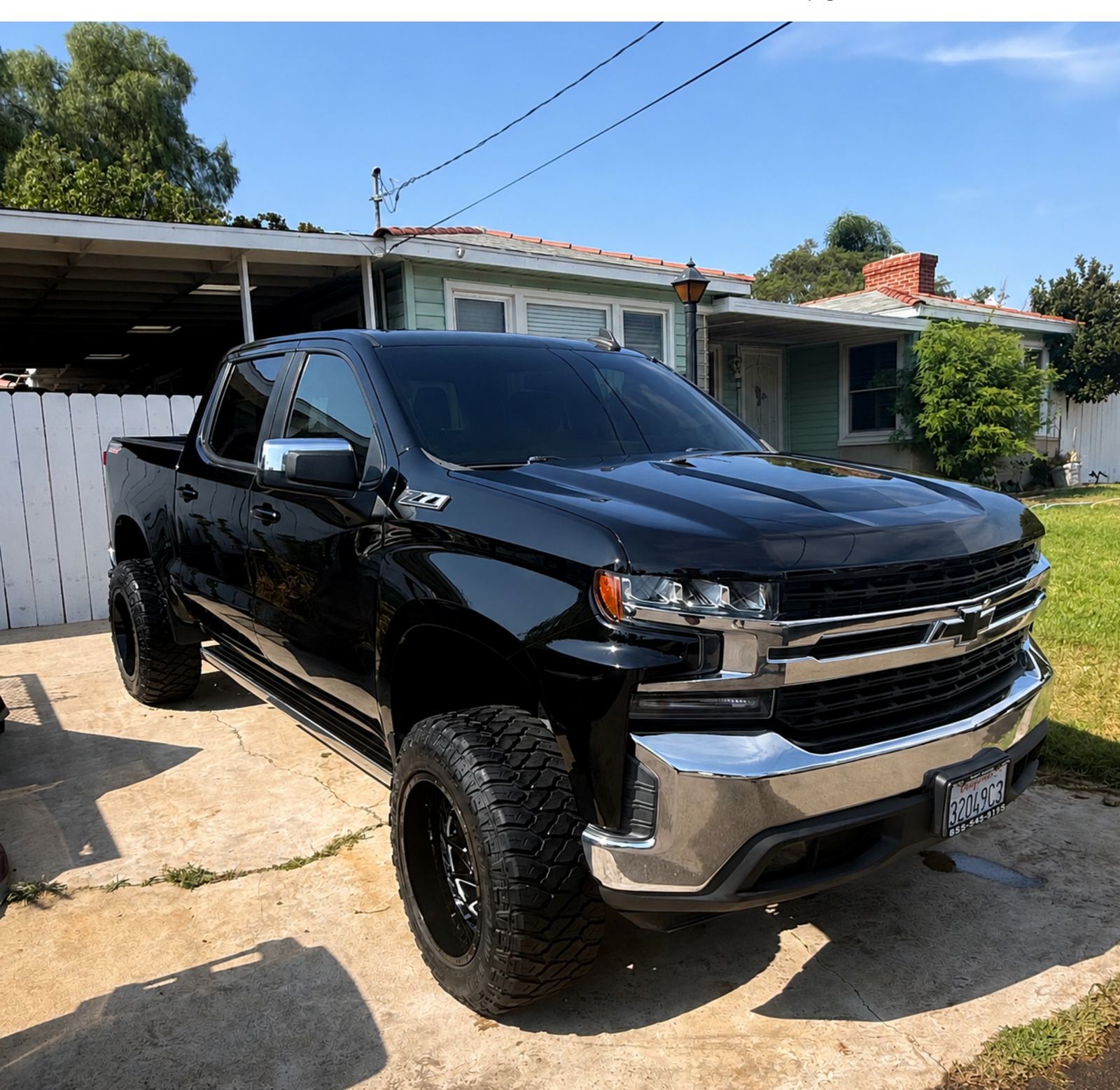 Detailed black lifted Chevrolet Silverado Z71, mobile detailing